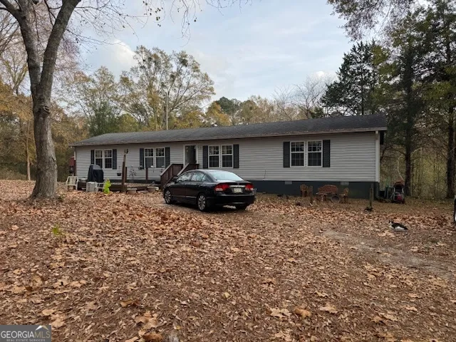 a view of a yard with trees