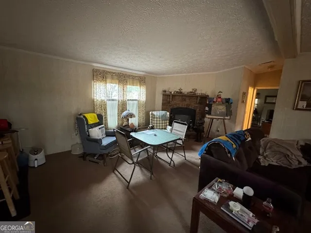 a living room with furniture window and a wooden floor