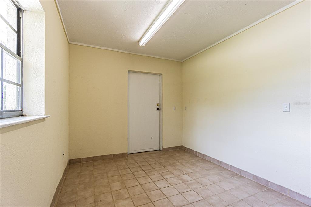 18129 Crawley Road, Unit 1 Odessa, FL 33556 - Photo 19 of 51 a view of an empty room