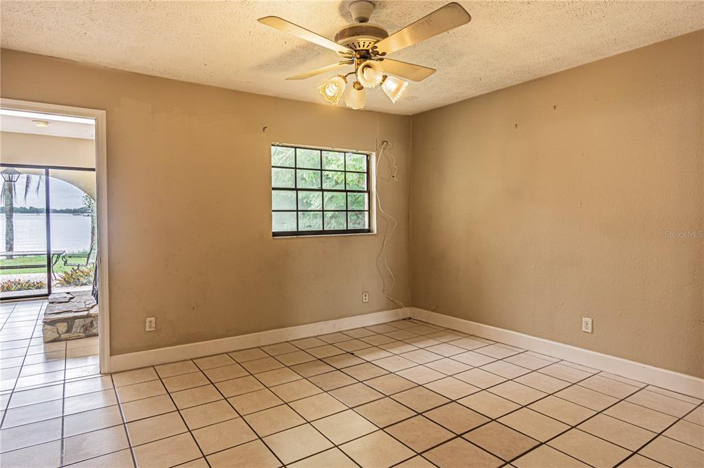 18129 Crawley Road, Unit 1 Odessa, FL 33556 - Photo 24 of 51 a view of an empty room and window