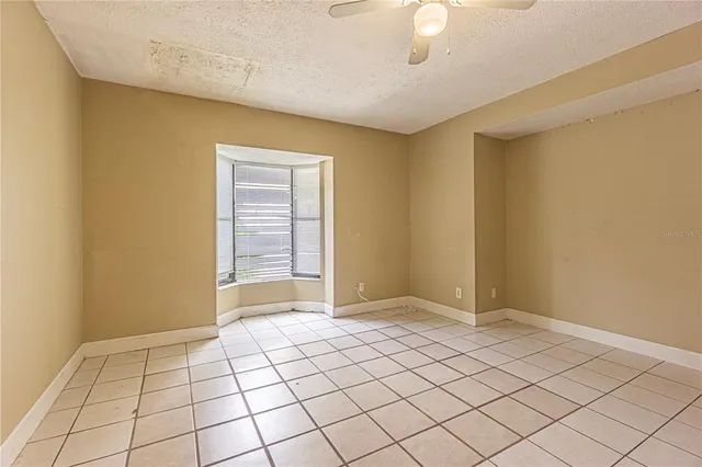 a view of empty room with windows