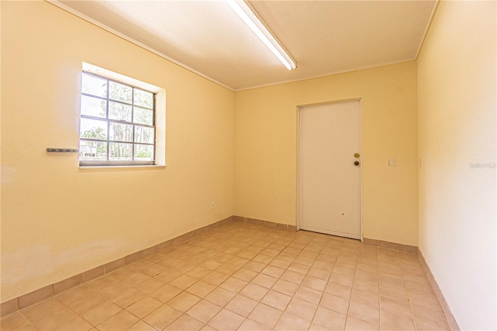 18129 Crawley Road, Unit 1 Odessa, FL 33556 - Photo 31 of 51 an empty room with windows
