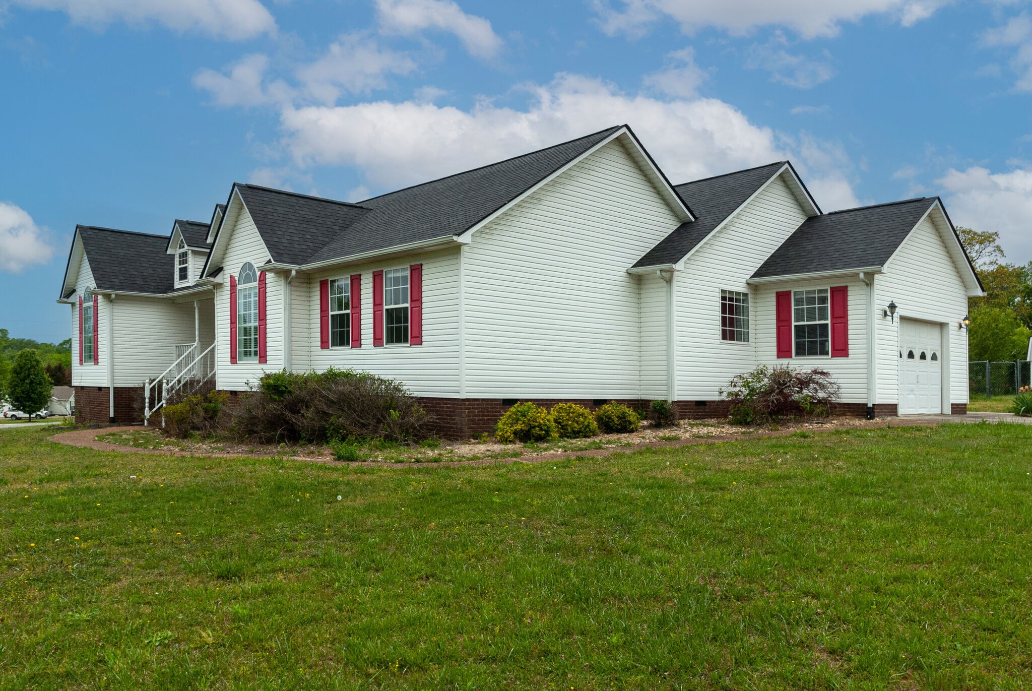 166 Caldwell Road Summertown, TN 38483 - Photo 2 of 36 a front view of house with yard and green space