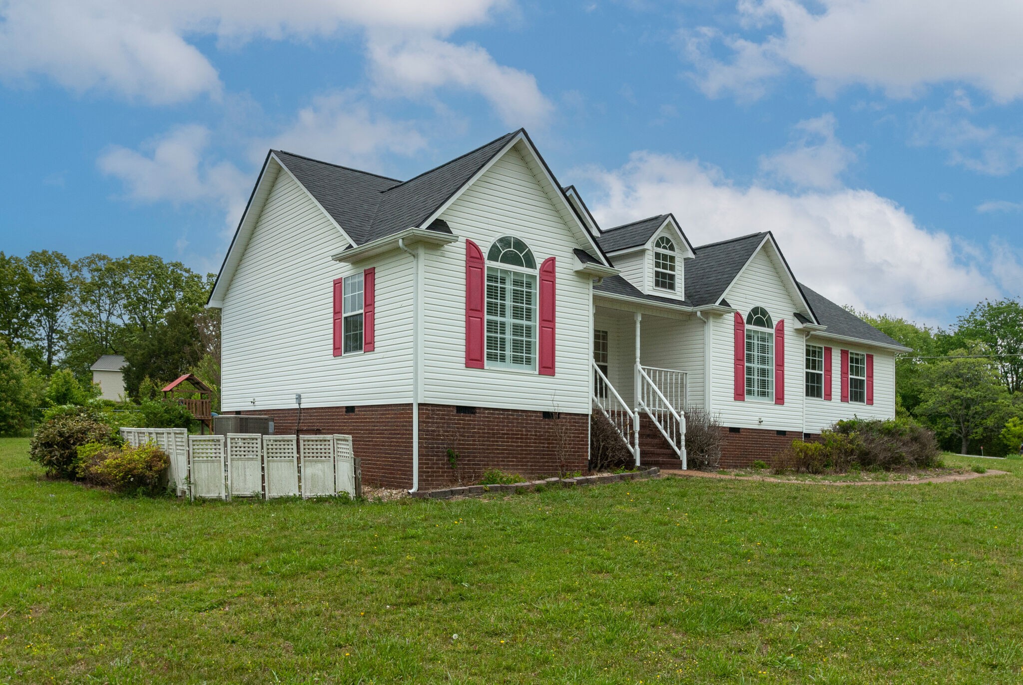 166 Caldwell Road Summertown, TN 38483 - Photo 3 of 36 a house view with a garden space