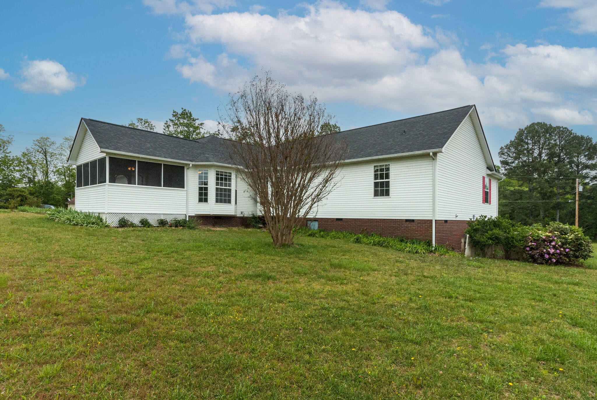 166 Caldwell Road Summertown, TN 38483 - Photo 31 of 36 a front view of house with yard and green space