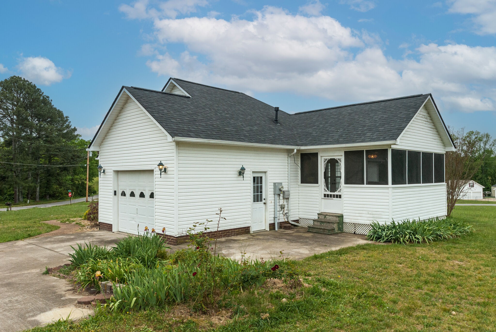 166 Caldwell Road Summertown, TN 38483 - Photo 32 of 36 a view of a house with backyard