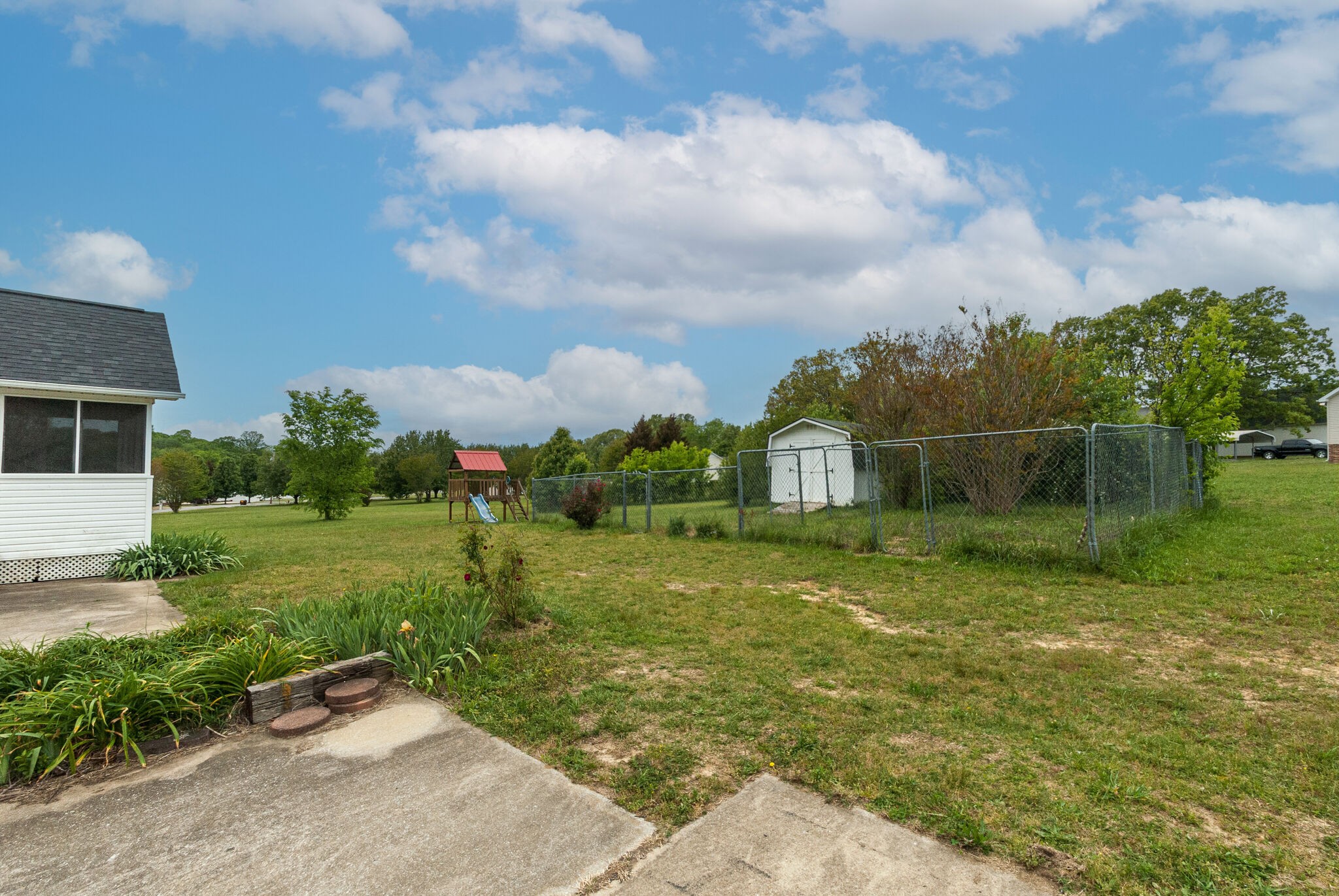 166 Caldwell Road Summertown, TN 38483 - Photo 33 of 36 a front view of a house with garden
