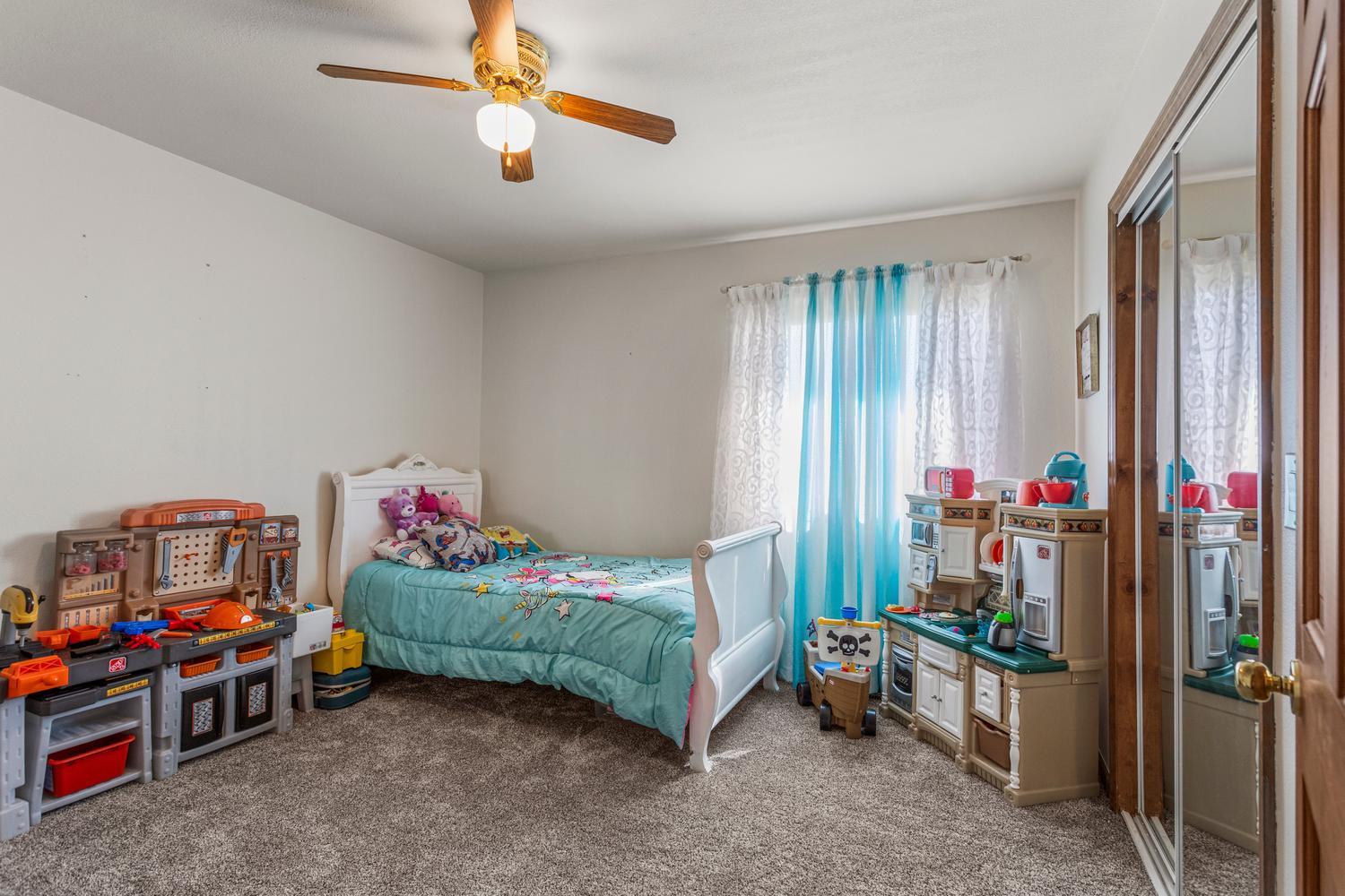 12317 North 1100 East Road Catlin, IL 61817 - Photo 28 of 44 a children room with toys and a window