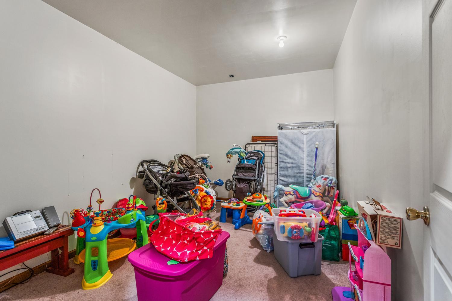 12317 North 1100 East Road Catlin, IL 61817 - Photo 38 of 44 a room with toys and storage