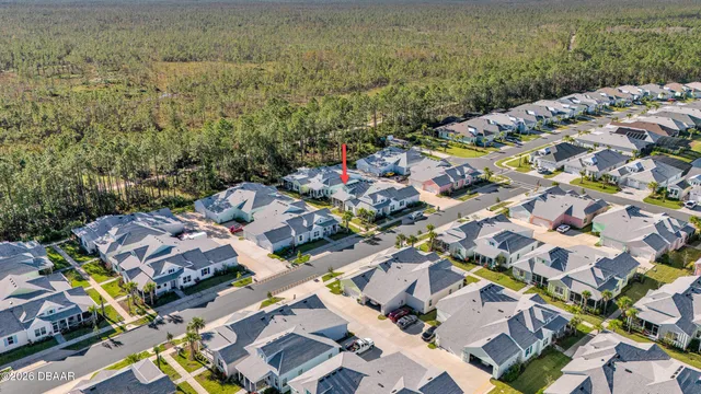 a view of a swimming pool with an outdoor space and seating