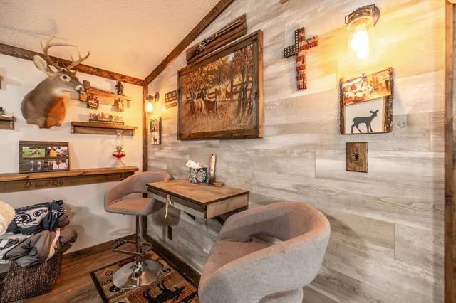 a bathroom with a sink a mirror and a shower curtain