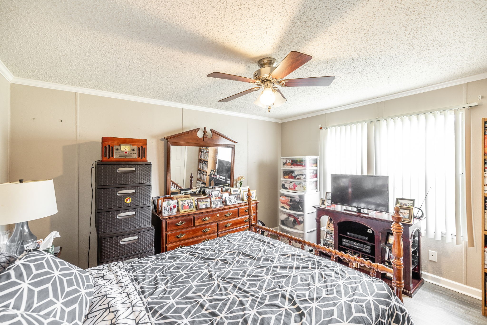5776 Craft Road Joelton, TN 37080 - Photo 28 of 57 a bedroom with furniture and a fireplace