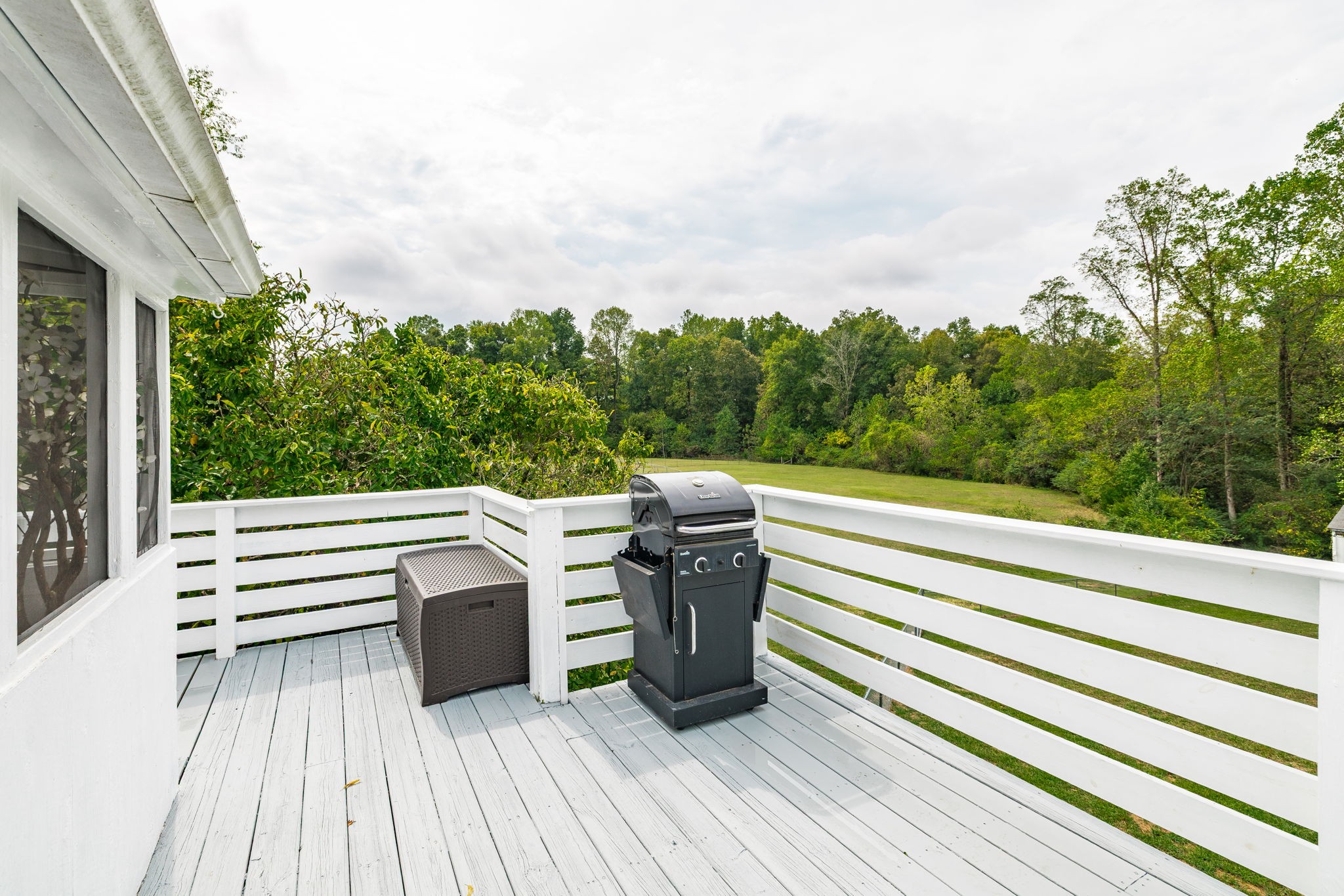 5776 Craft Road Joelton, TN 37080 - Photo 37 of 57 a view of a balcony with wooden floor and outdoor space
