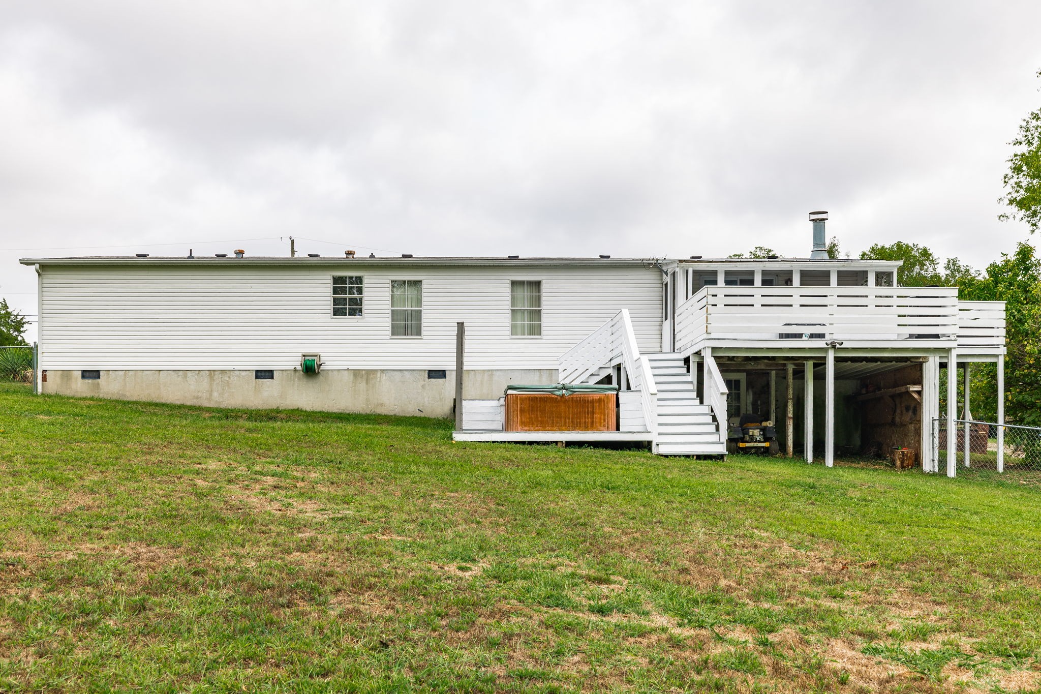 5776 Craft Road Joelton, TN 37080 - Photo 38 of 57 a view of a terrace with a garden and lake