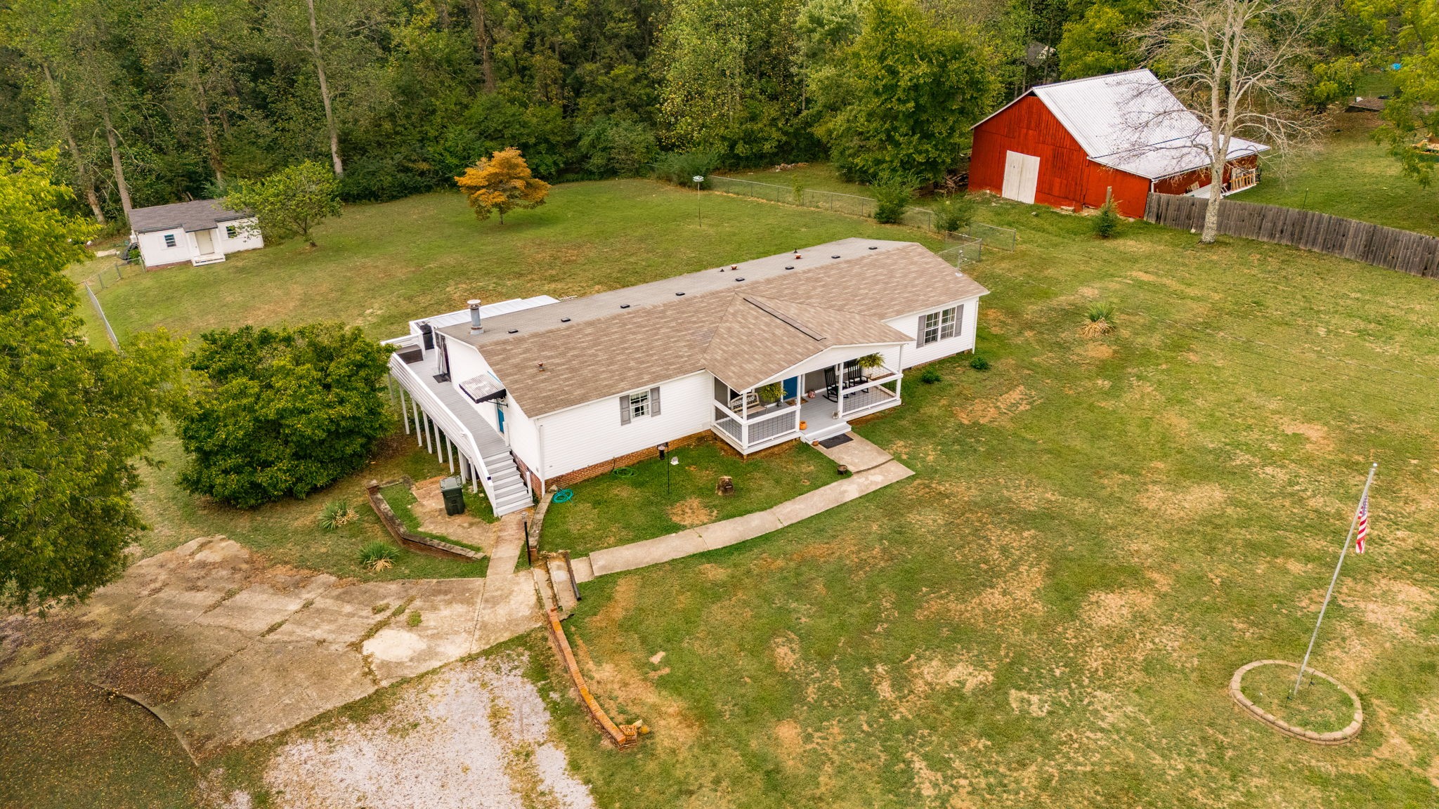 5776 Craft Road Joelton, TN 37080 - Photo 49 of 57 an aerial view of a house with garden space and street view