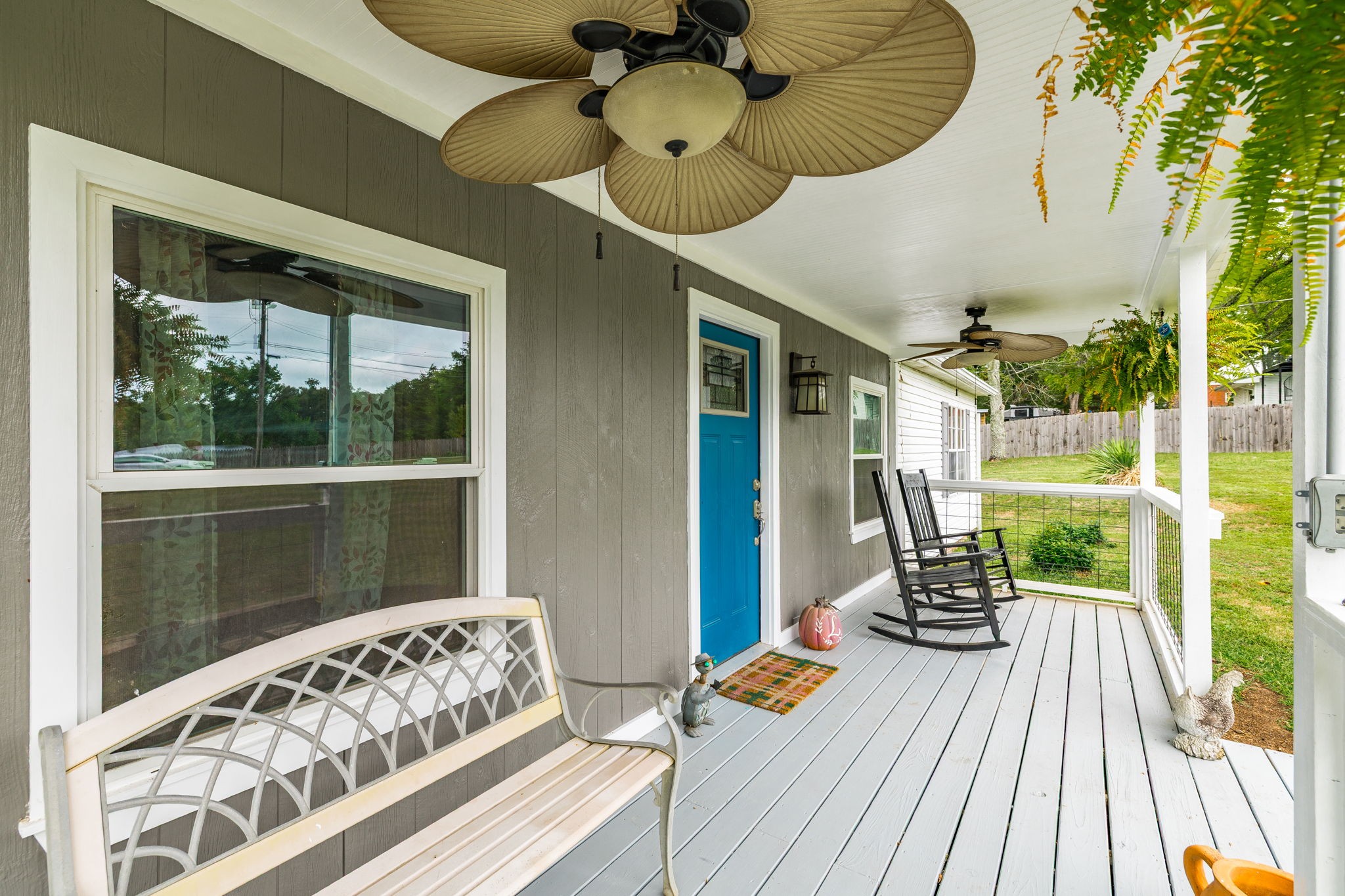5776 Craft Road Joelton, TN 37080 - Photo 5 of 57 a view of a balcony with chair and wooden floor