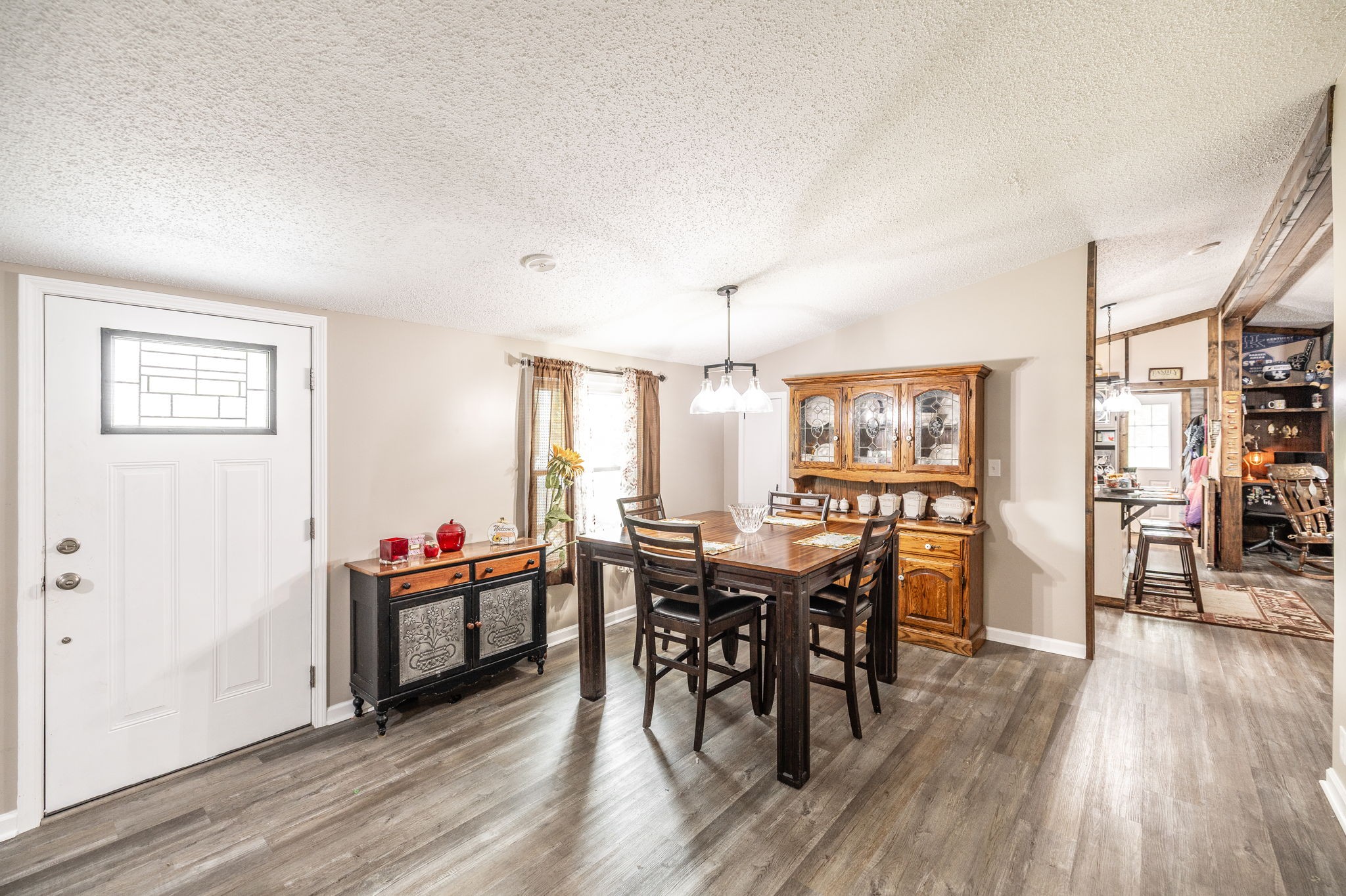 5776 Craft Road Joelton, TN 37080 - Photo 8 of 57 a view of a dining room with furniture and wooden floor