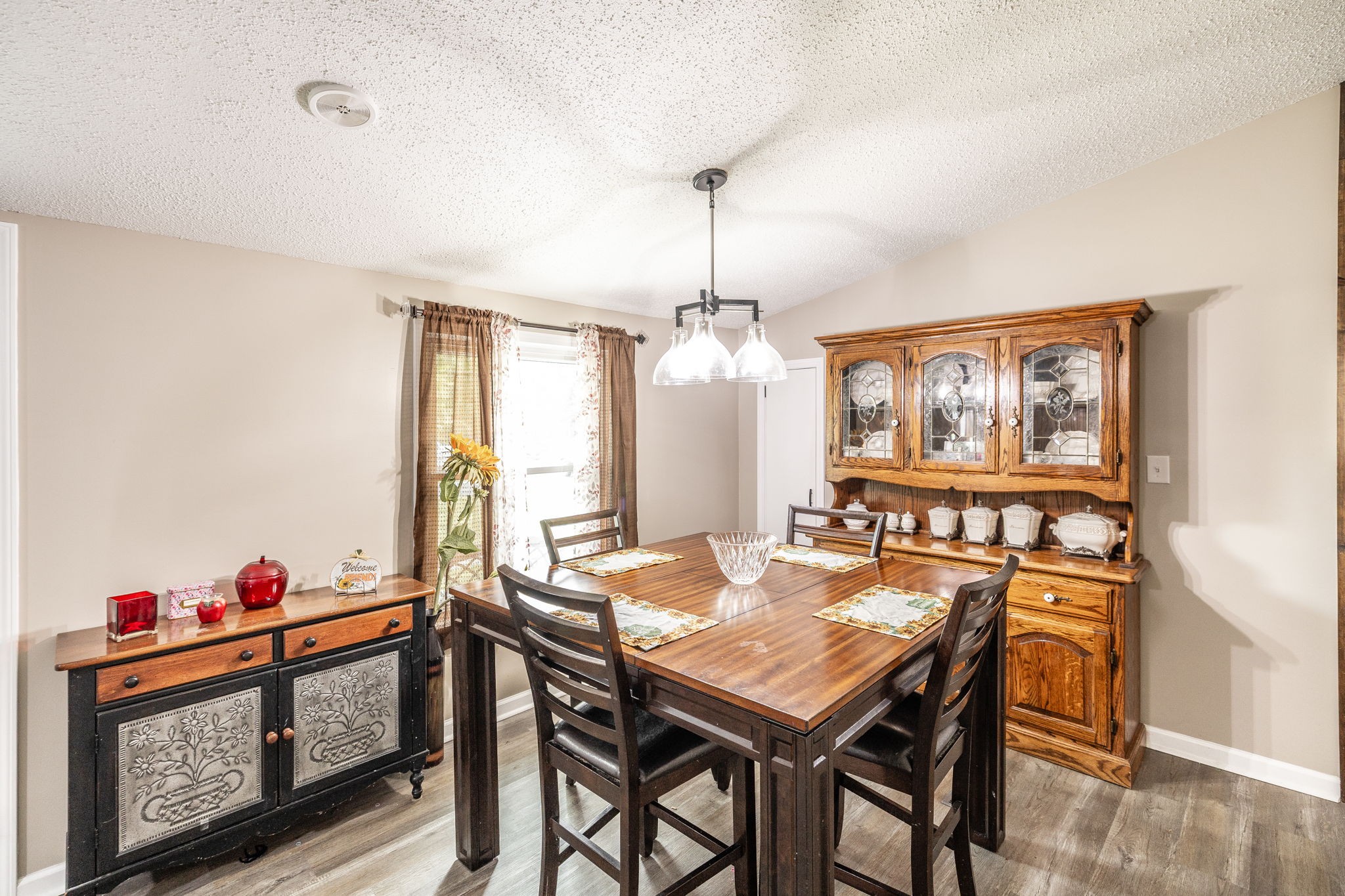 5776 Craft Road Joelton, TN 37080 - Photo 9 of 57 a view of a dining room with furniture window and wooden floor