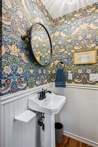 a bathroom with a sink and mirror