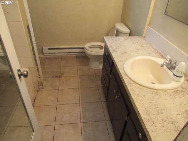 a bathroom with a sink and a toilet