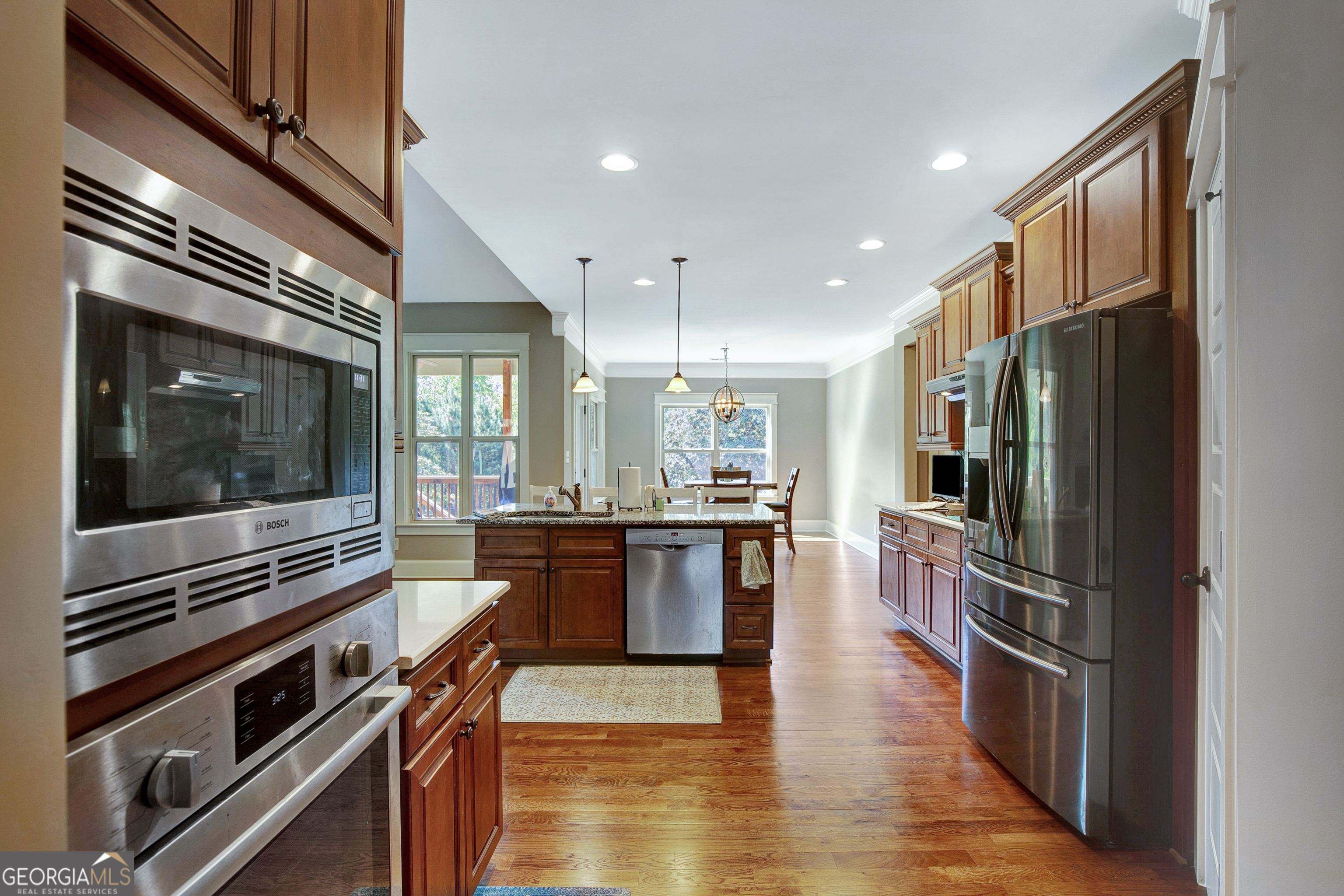 137 Kenmare Row Tyrone, GA 30290 - Photo 69 of 91 a kitchen with lots of counter top space and stainless steel appliances