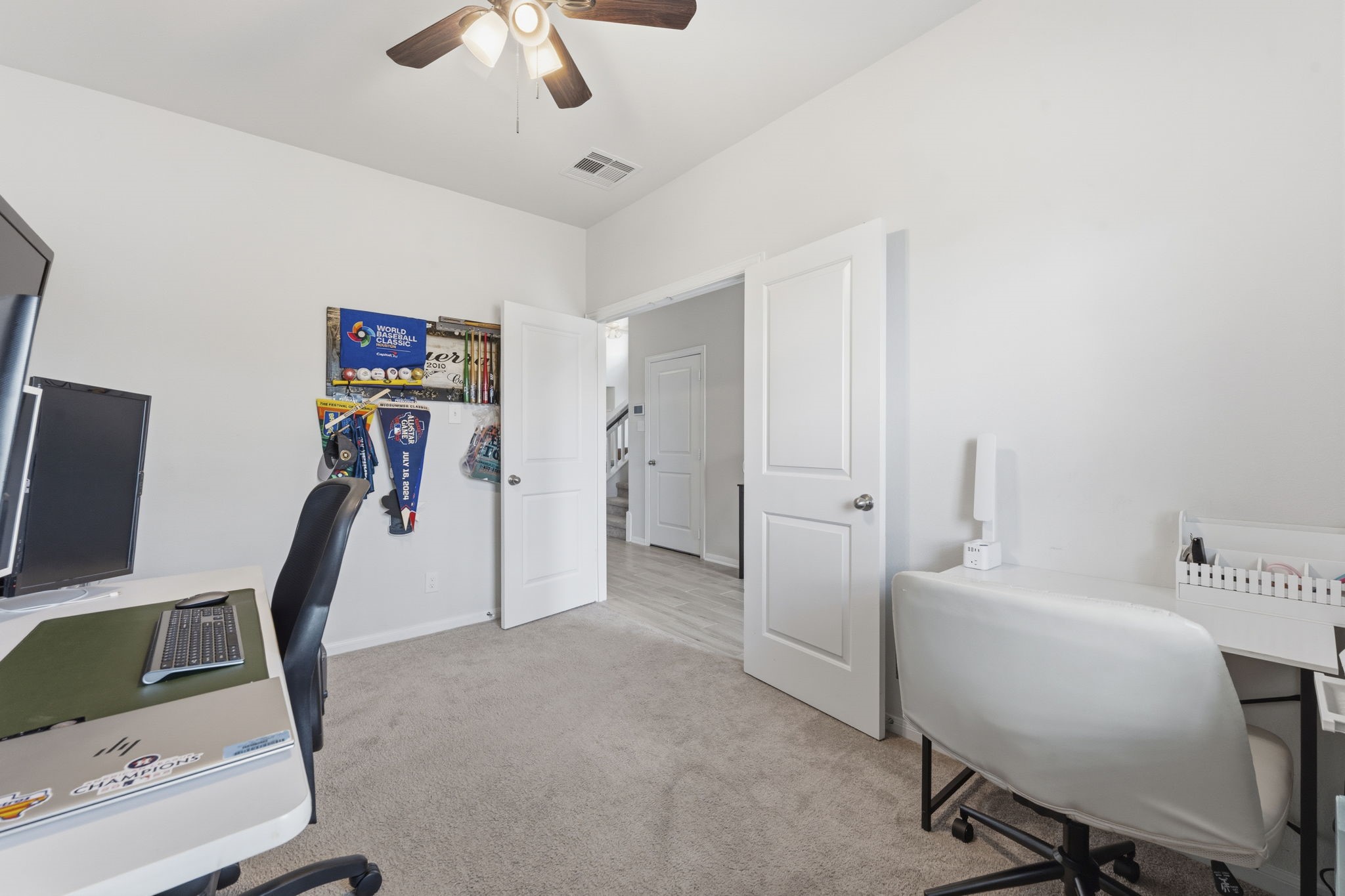 2401 Abbot Brk Drive Rosharon, TX 77583 - Photo 8 of 50 Another view of the Study. Thoughtfully designed with double doors for enhanced privacy and noise reduction, this study offers a peaceful retreat for productivity and focus.