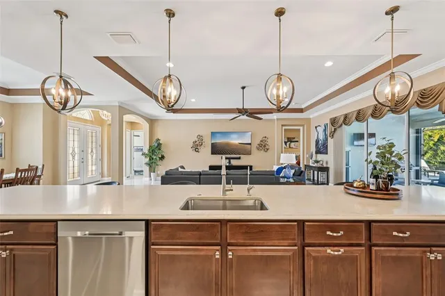 a kitchen with a counter space cabinets and stainless steel appliances