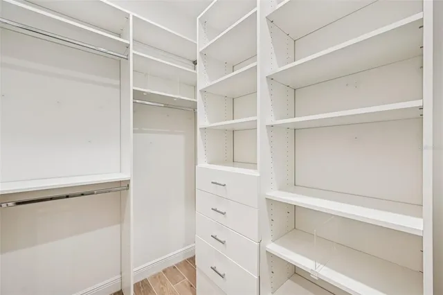 a view of an empty walk in closet