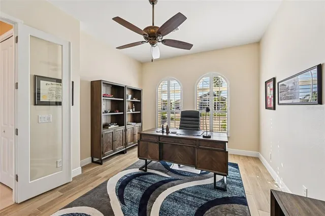 a bedroom with furniture and a window