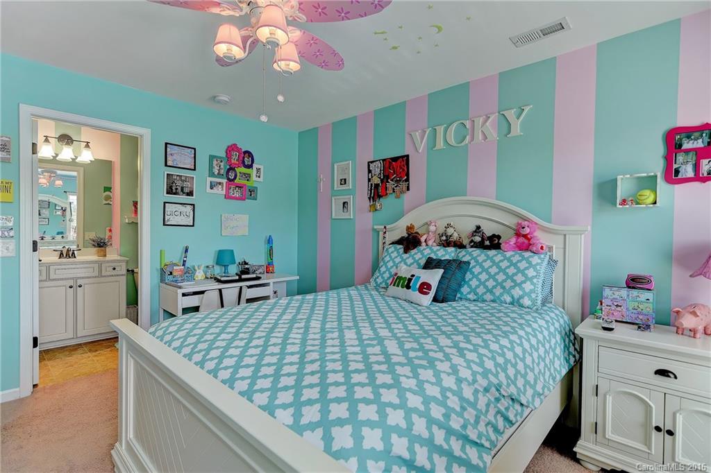 1428 Ridgehaven Road Waxhaw, NC 28173 - Photo 15 of 24 a bedroom with a bed and dresser