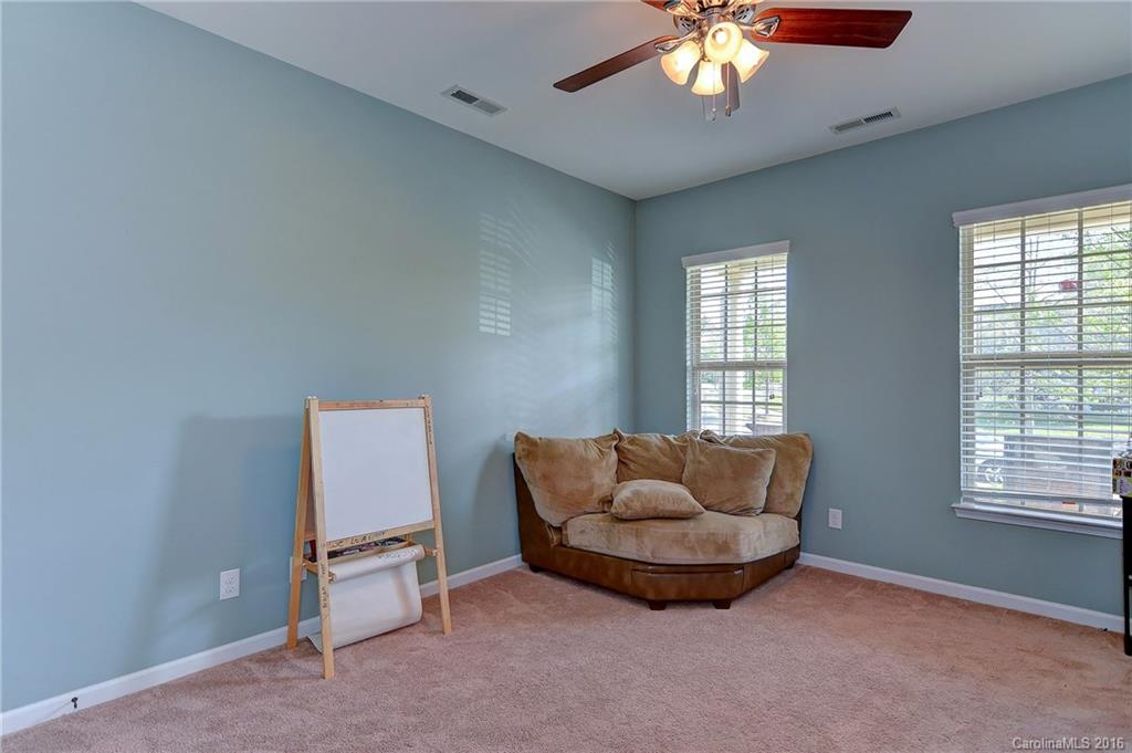 1428 Ridgehaven Road Waxhaw, NC 28173 - Photo 9 of 24 a living room with furniture and a window