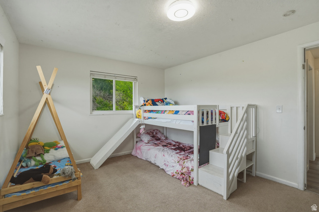 500 North 800 East Springville, UT 84663 - Photo 17 of 51 Bedroom featuring light colored carpet and baseboards