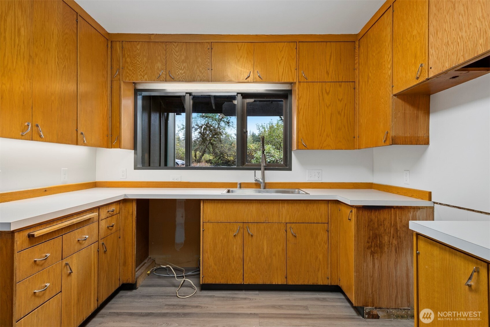 18928 Bow Hill Road Burlington, WA 98233 - Photo 15 of 39 a kitchen with a sink and cabinets