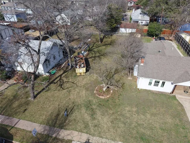 an aerial view of residential house with outdoor space