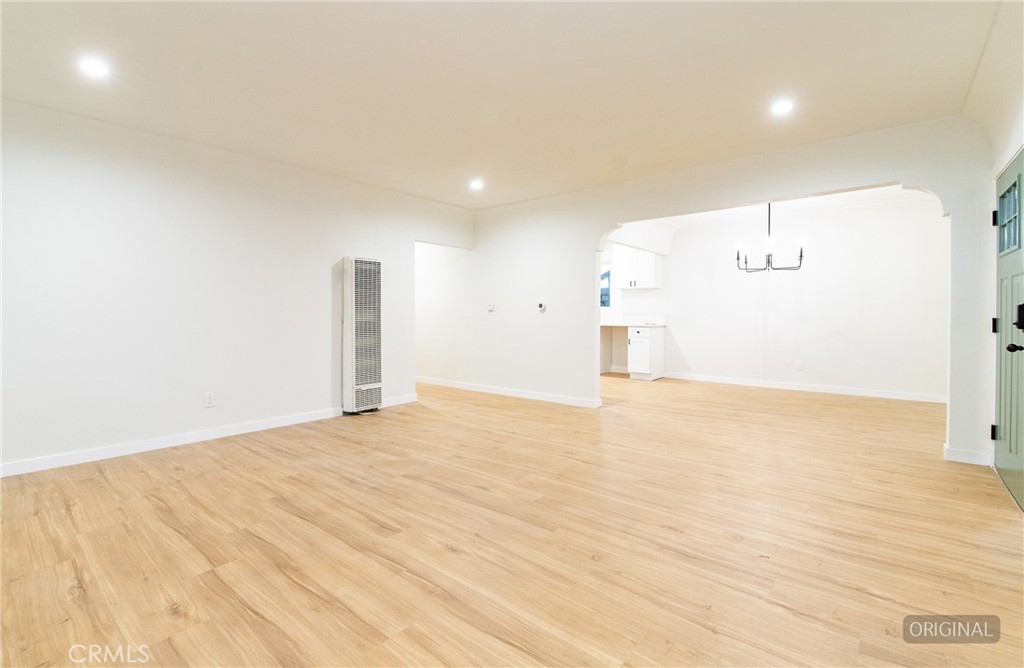 1100 East Tichenor Street Compton, CA 90221 - Photo 26 of 34 a view of empty room with wooden floor
