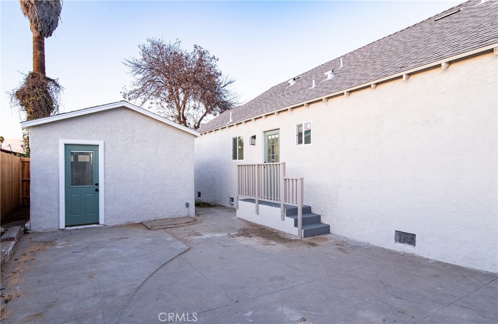 1100 East Tichenor Street Compton, CA 90221 - Photo 27 of 34 a view of a house with a street