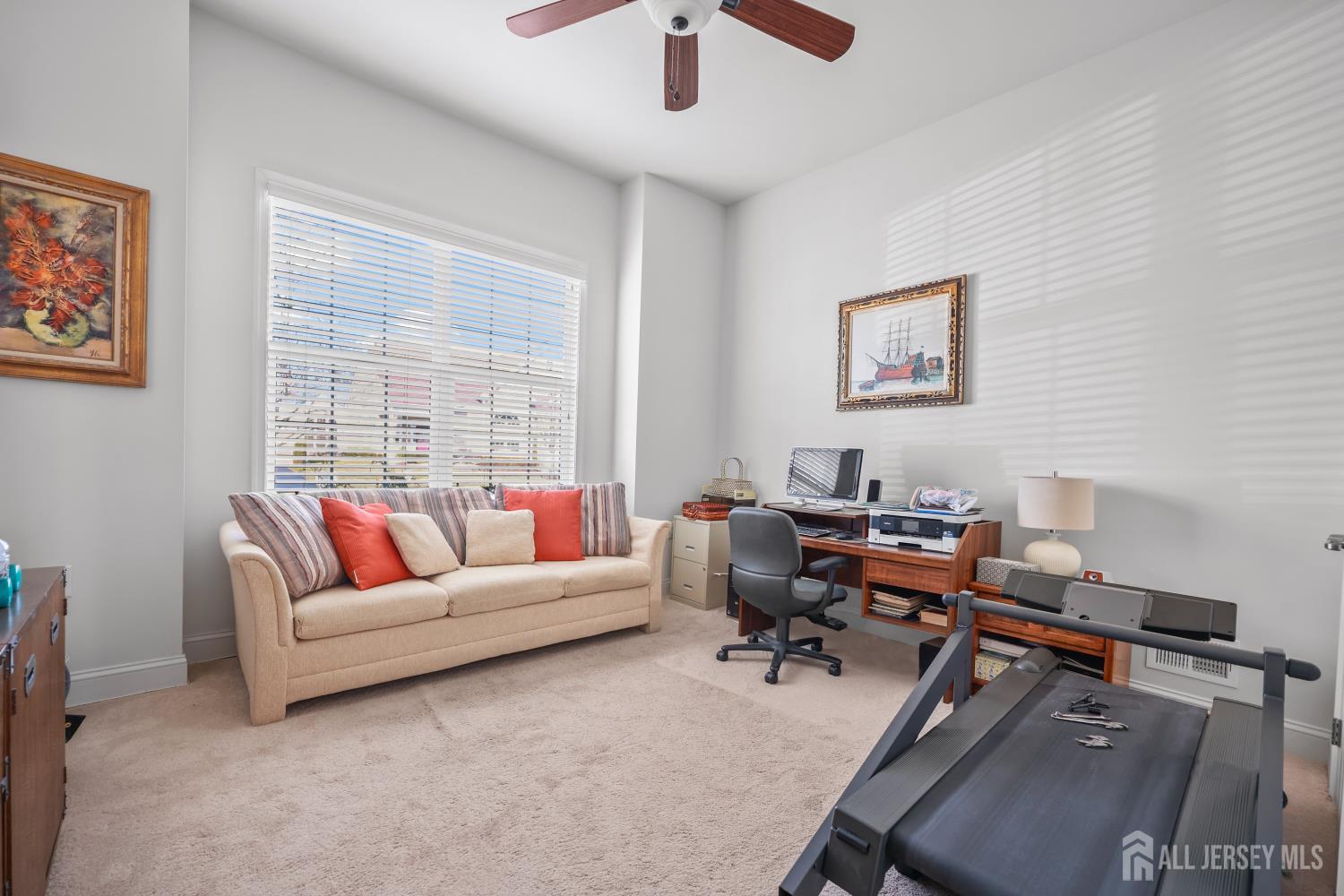 46 Mandrake Road Monroe Township, NJ 08831 - Photo 14 of 58 a living room with furniture a rug and a window