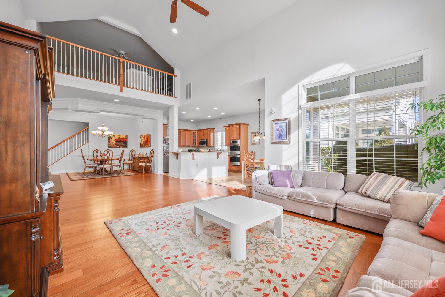 46 Mandrake Road Monroe Township, NJ 08831 - Photo 17 of 58 a living room with furniture and a table