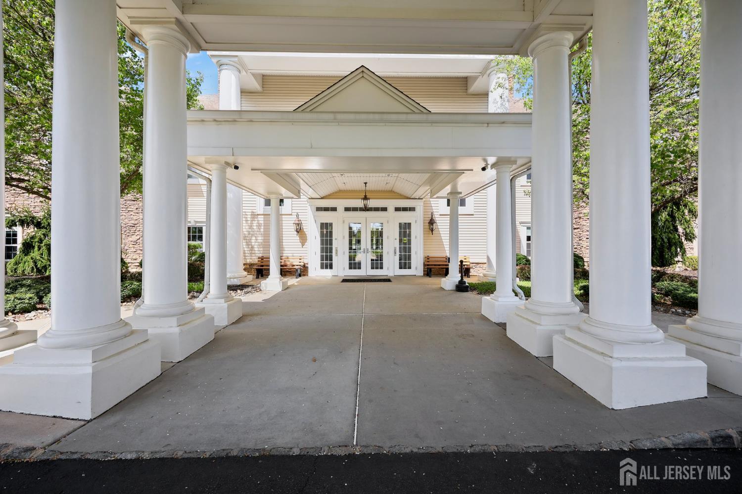 46 Mandrake Road Monroe Township, NJ 08831 - Photo 42 of 58 a living room with furniture and a fireplace
