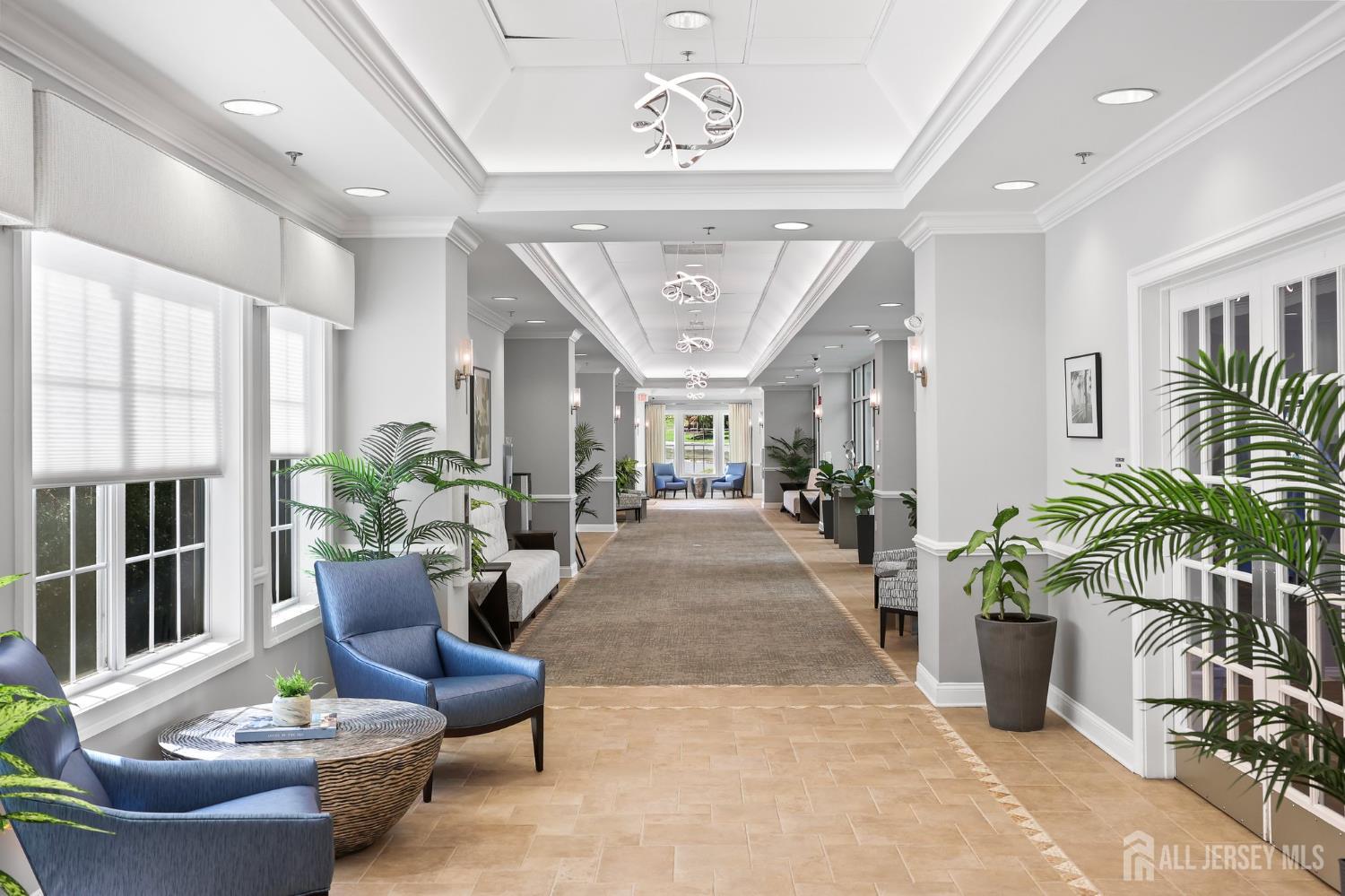 46 Mandrake Road Monroe Township, NJ 08831 - Photo 52 of 58 a living room with furniture potted plant and a window