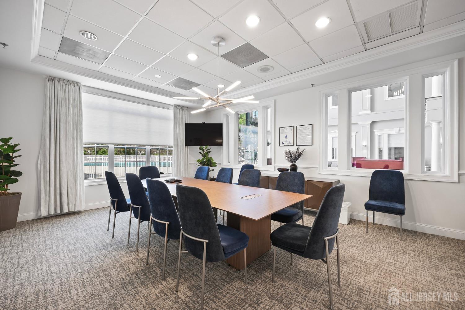 46 Mandrake Road Monroe Township, NJ 08831 - Photo 53 of 58 a view of a dining room with furniture window and wooden floor