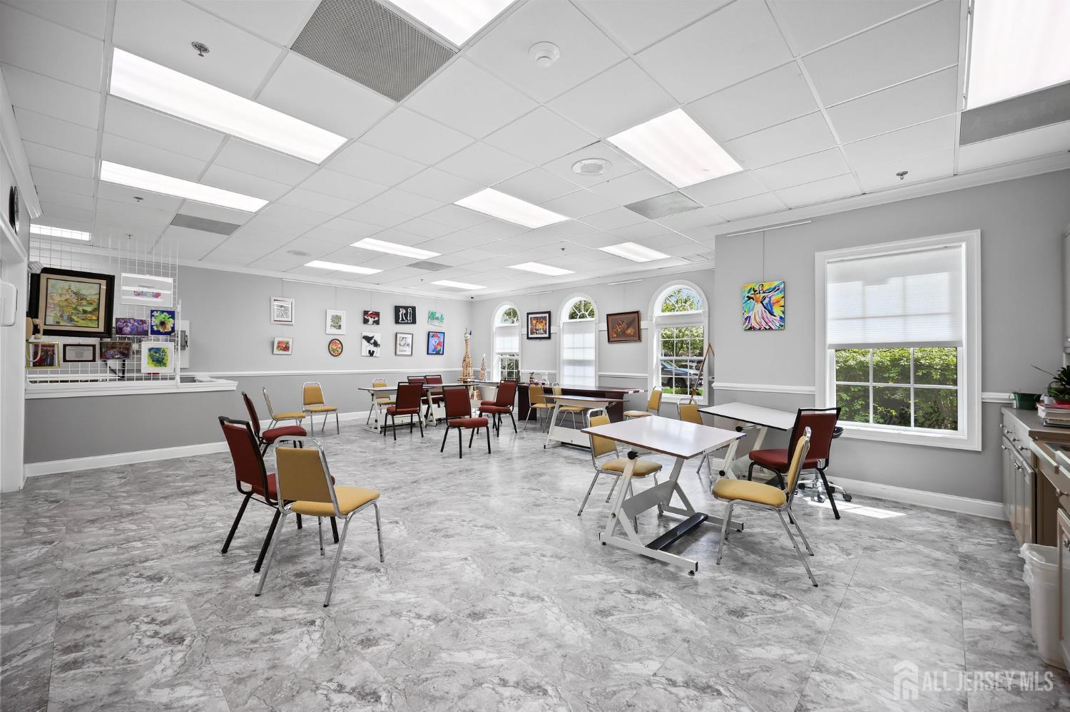 46 Mandrake Road Monroe Township, NJ 08831 - Photo 54 of 58 a living room with furniture and a large window