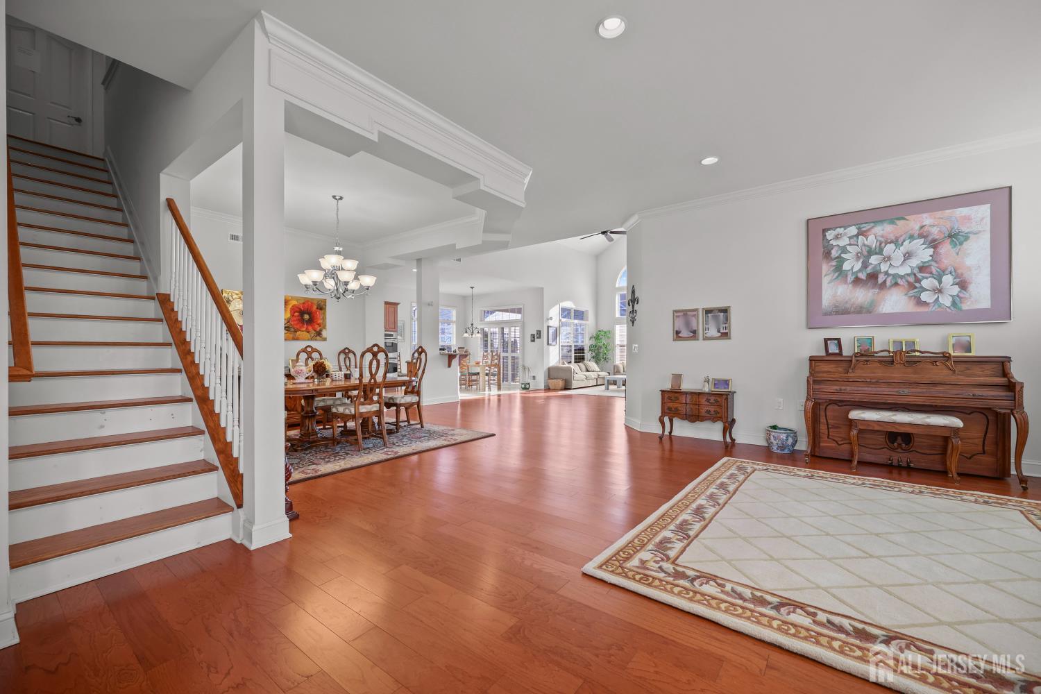 46 Mandrake Road Monroe Township, NJ 08831 - Photo 7 of 58 a living room with furniture and a fireplace