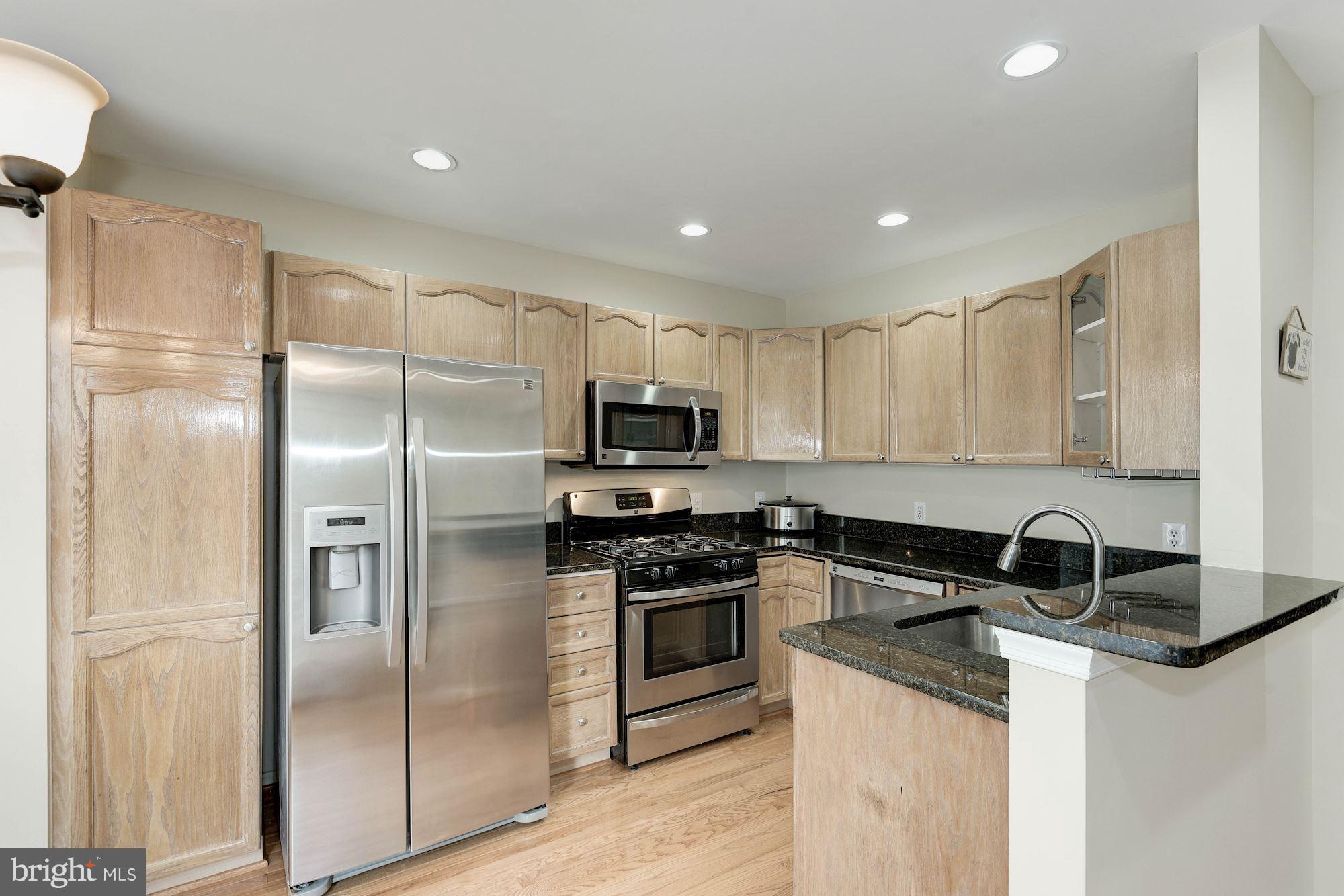 4668 West Braddock Road Alexandria, VA 22311 - Photo 9 of 29 Kitchen features Granite and SS Appliances