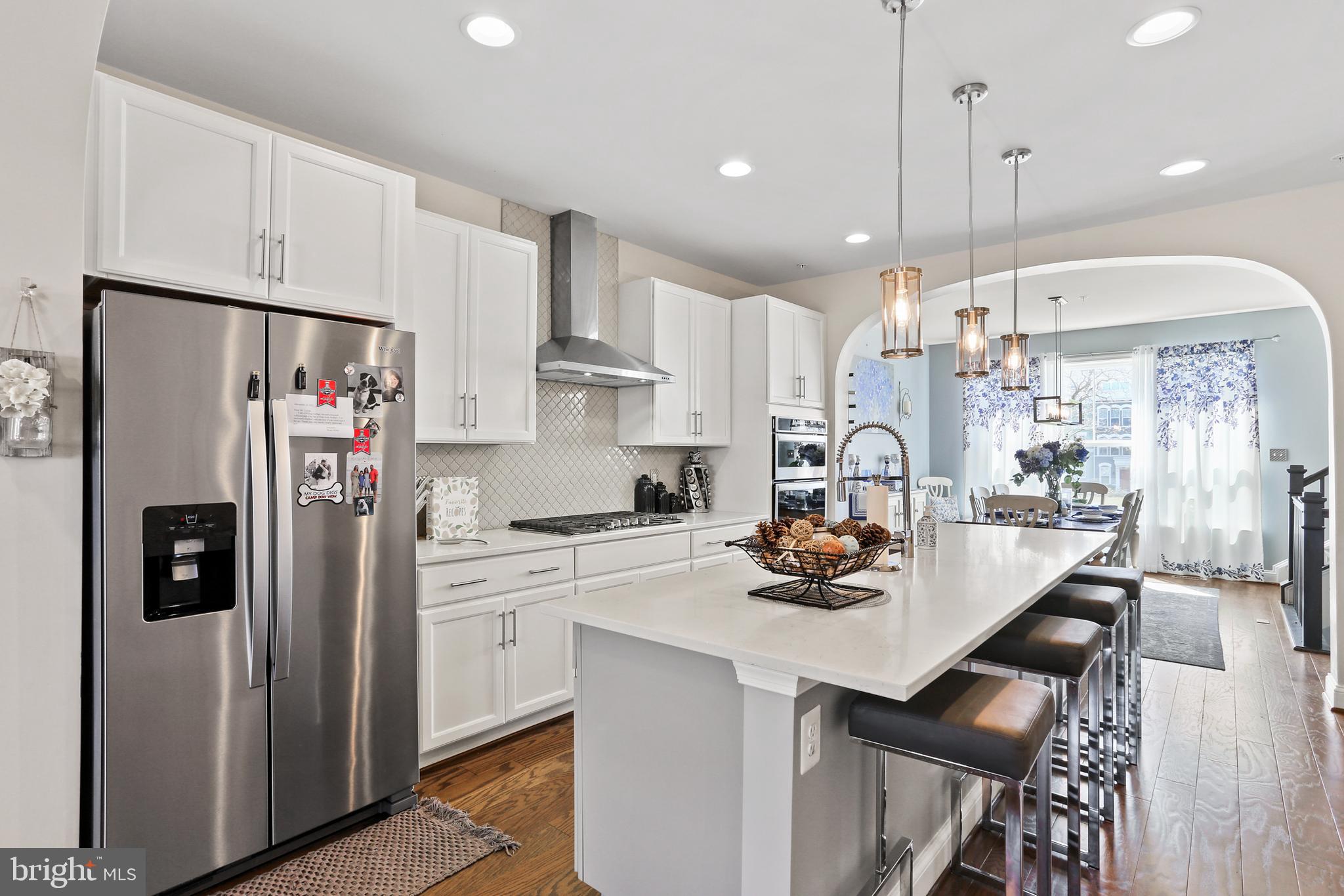 902 Lindley Road Frederick, MD 21701 - Photo 11 of 46 Gas cooktop and island with seating