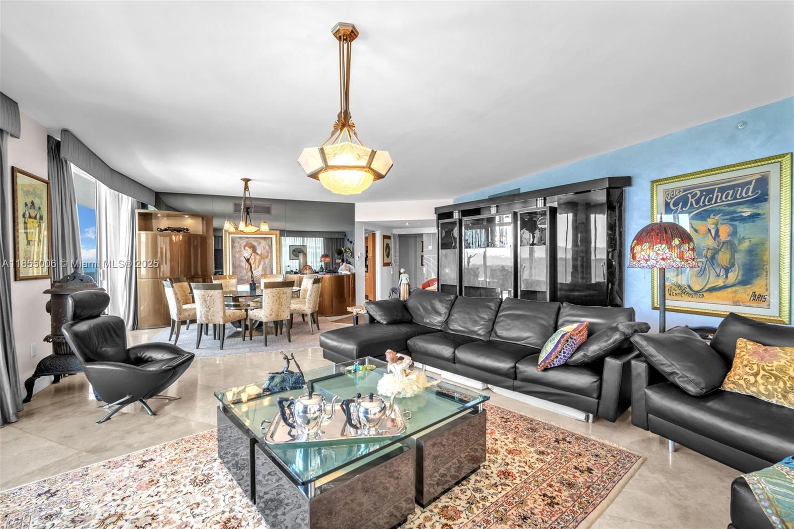 9595 Collins Avenue, Unit N9A Surfside, FL 33154 - Photo 28 of 66 a living room with furniture fireplace and rug