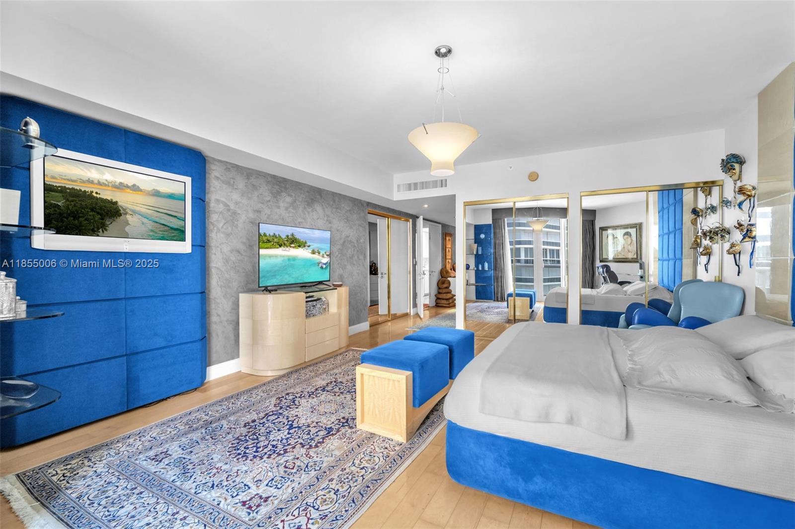 9595 Collins Avenue, Unit N9A Surfside, FL 33154 - Photo 31 of 66 a living room with bed and a flat screen tv