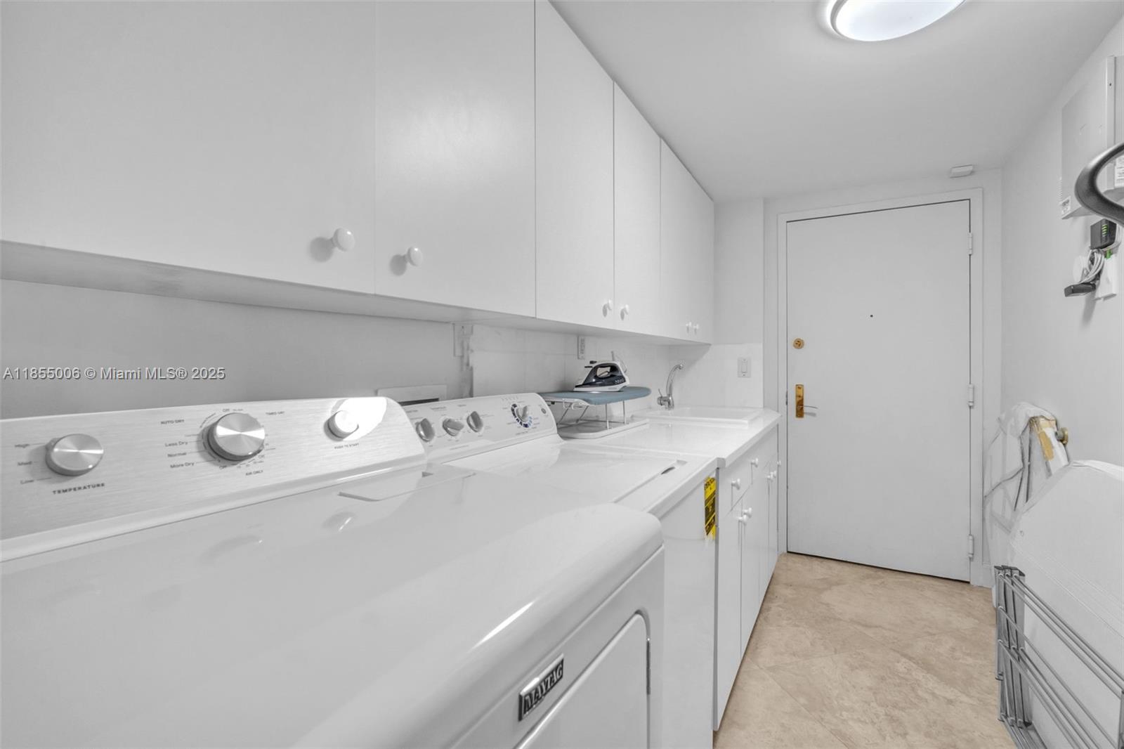 9595 Collins Avenue, Unit N9A Surfside, FL 33154 - Photo 44 of 66 a utility room with dryer and washer
