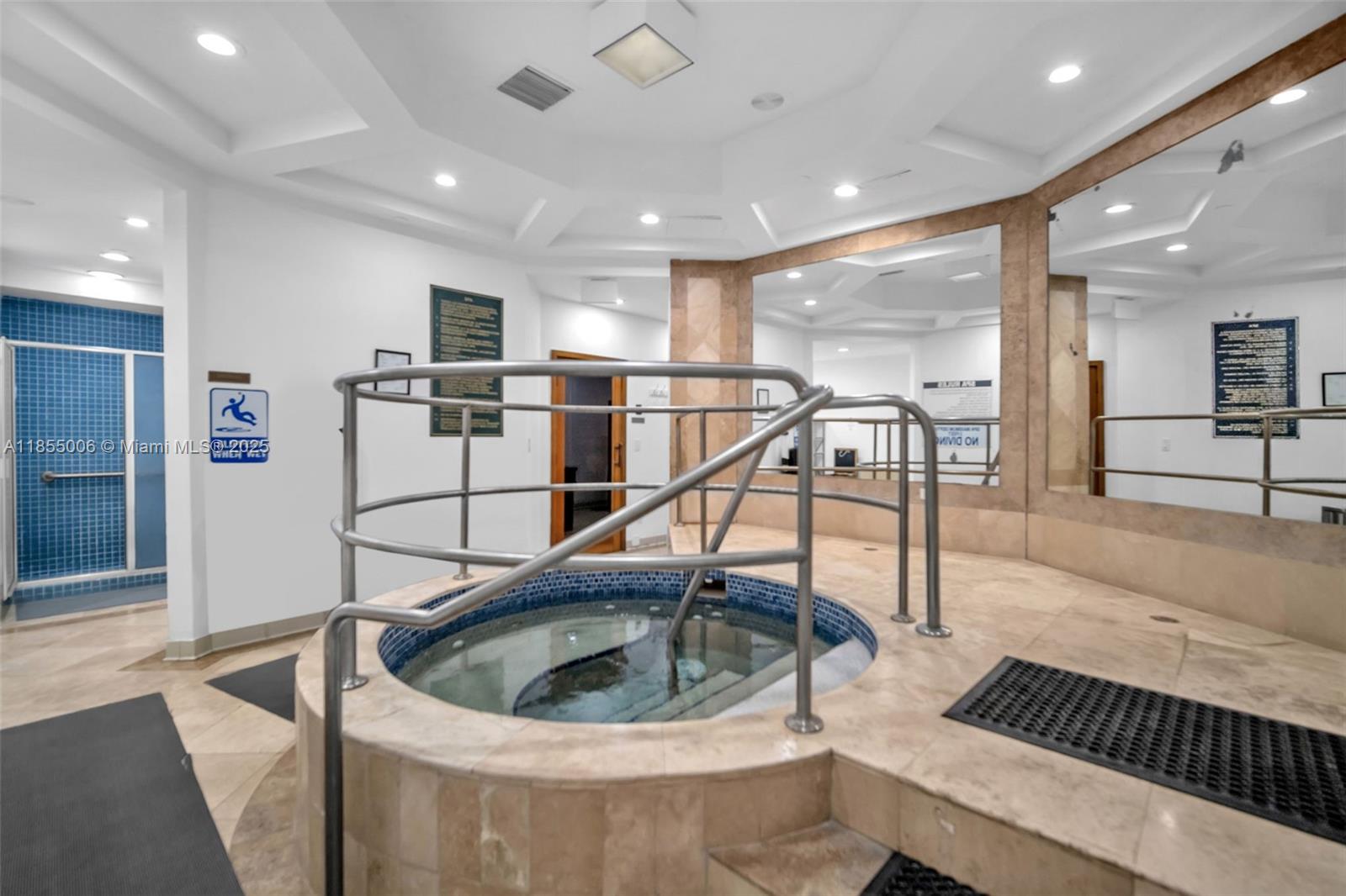 9595 Collins Avenue, Unit N9A Surfside, FL 33154 - Photo 60 of 66 a kitchen with a sink a counter top space and stainless steel appliances