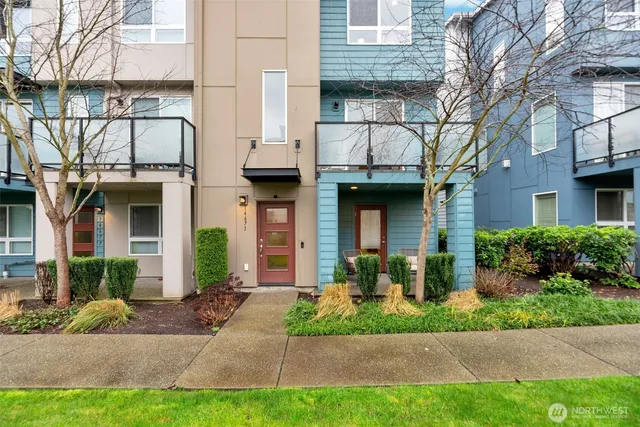 a front view of a brick house with a yard